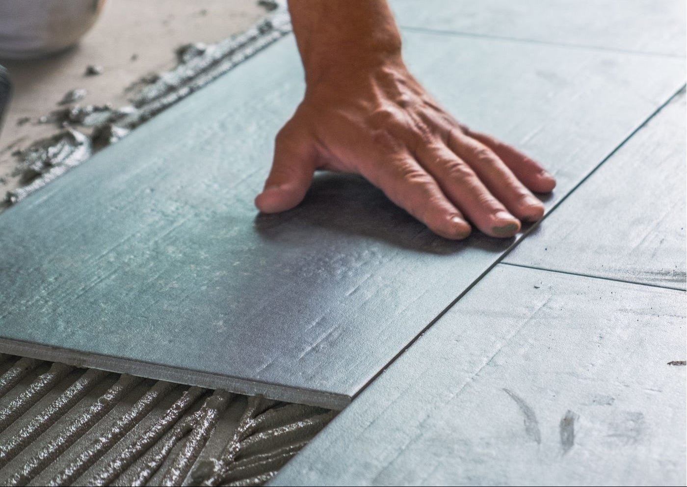 Professional tile and grout cleaning service on ceramic floor tiles